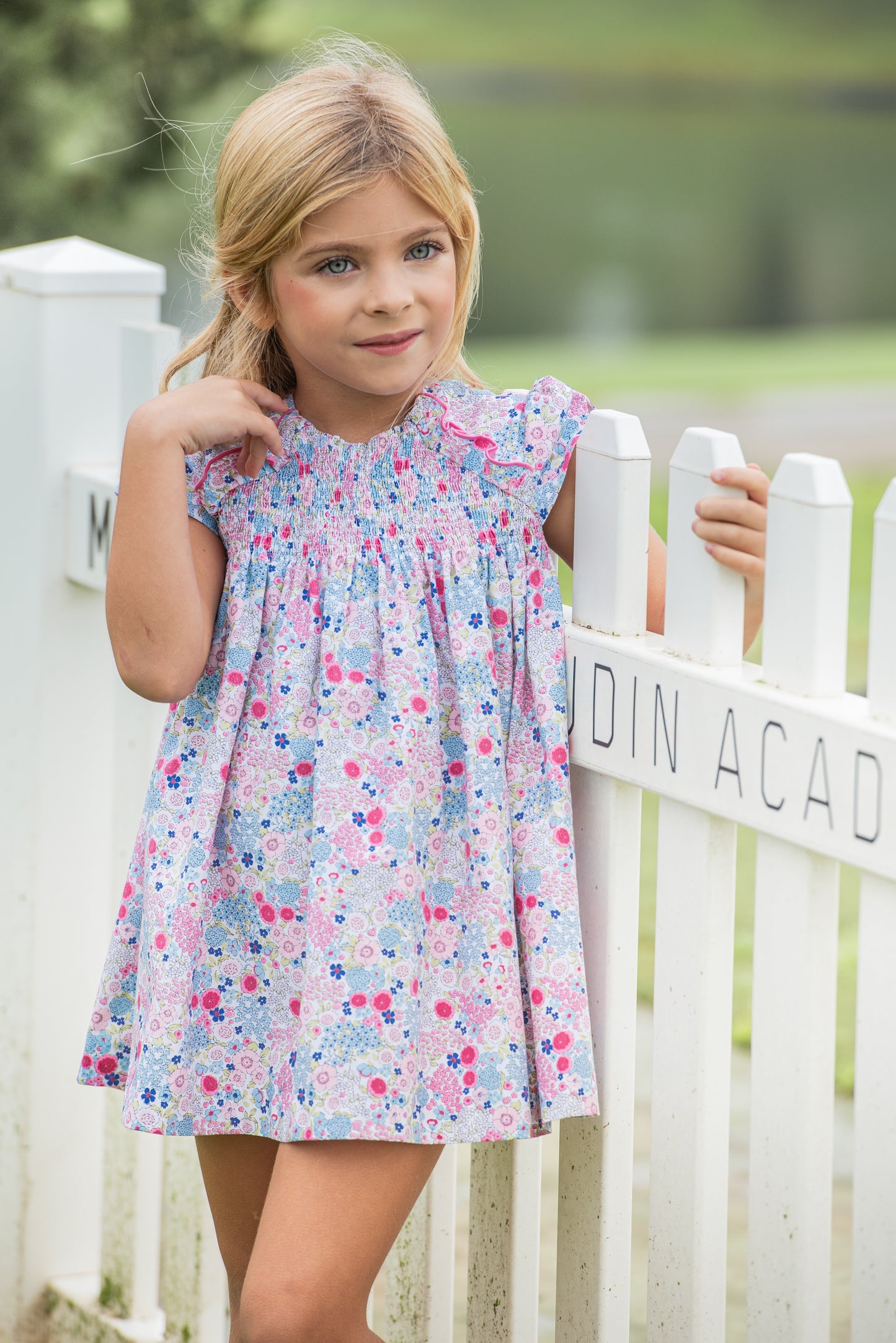 Girl's Pink Dress with a Tiny Floral Print.