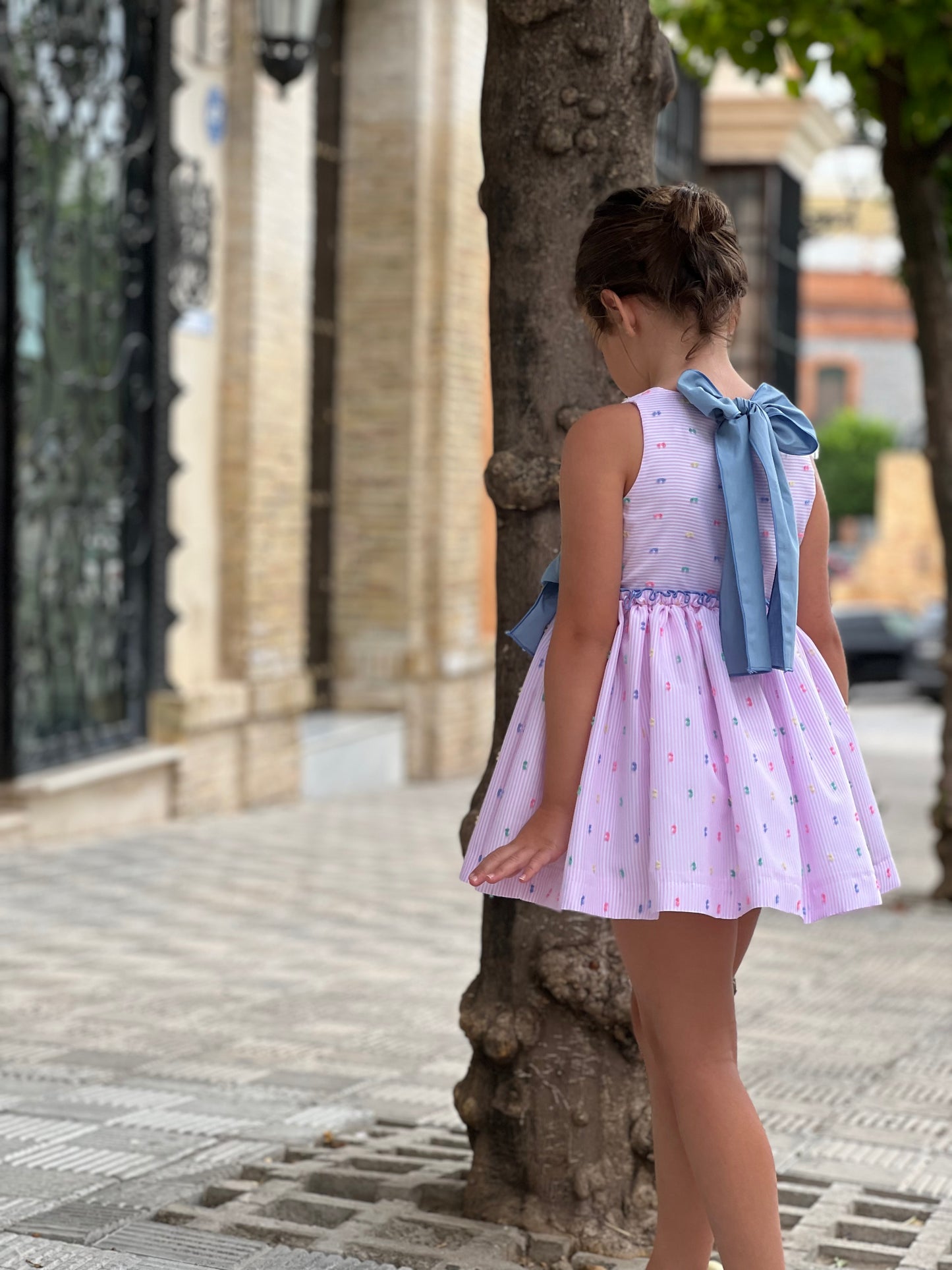 Pink dress with blue bow