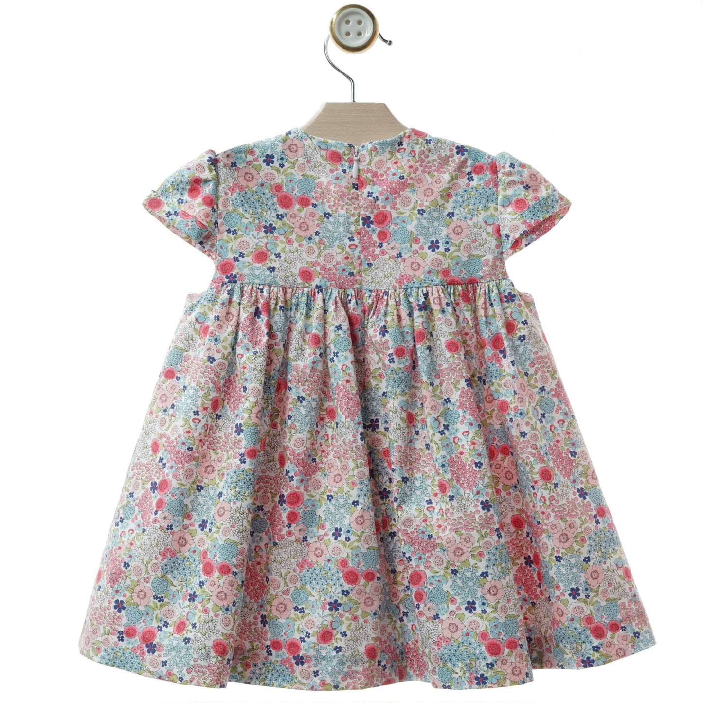 Girl's Pink Dress with a Tiny Floral Print.